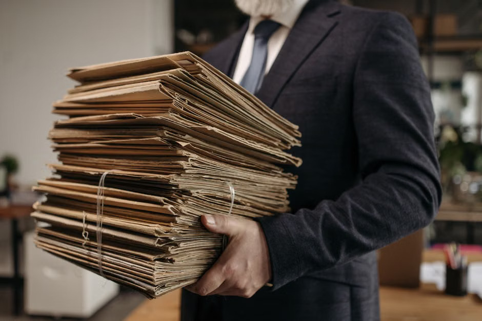 Notary Public maintaining secure digital notary records on a mobile app showing organized journal entries